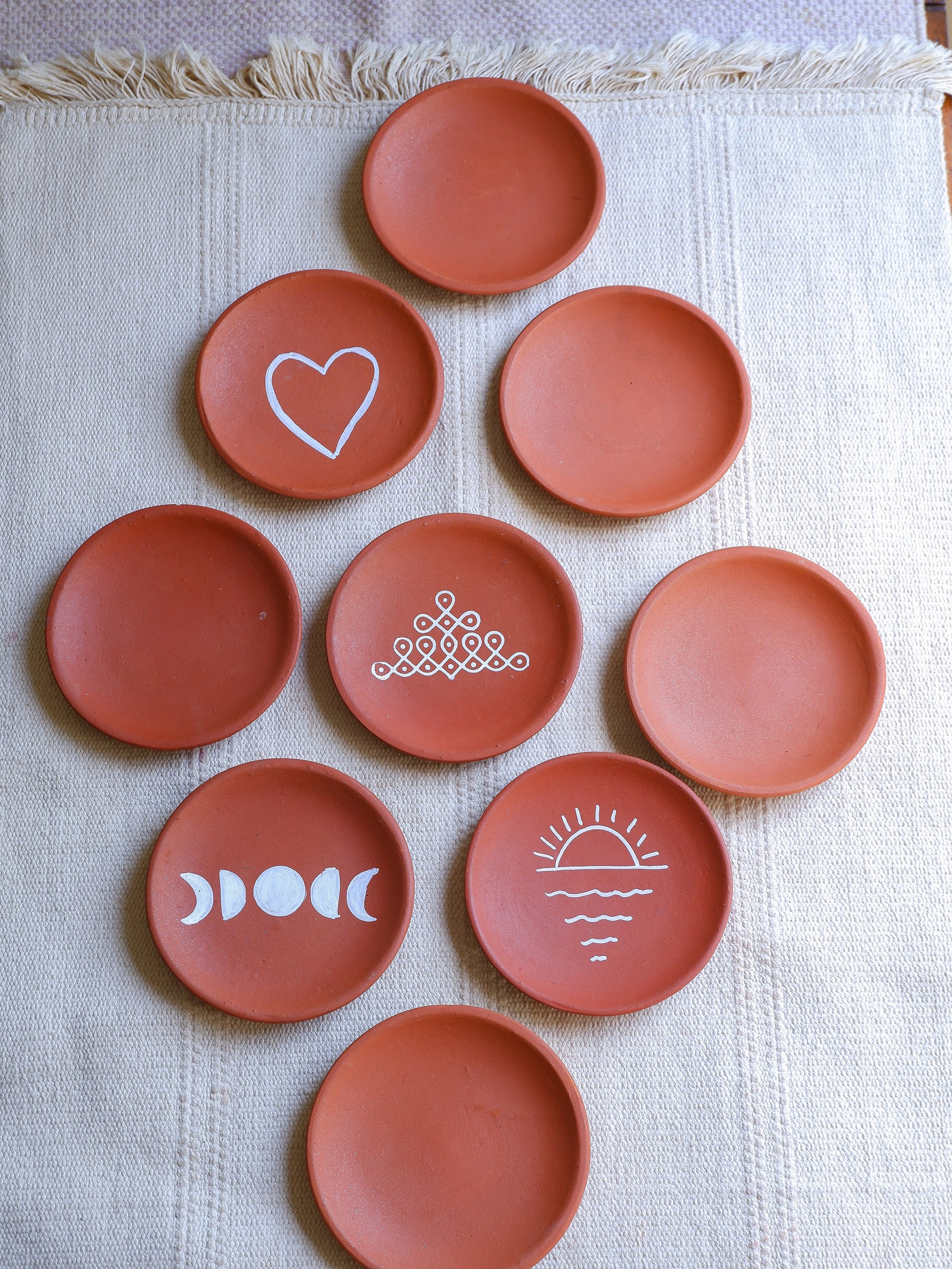 Set of 6 terracotta wall plates for painting – eco-friendly craft supplies.