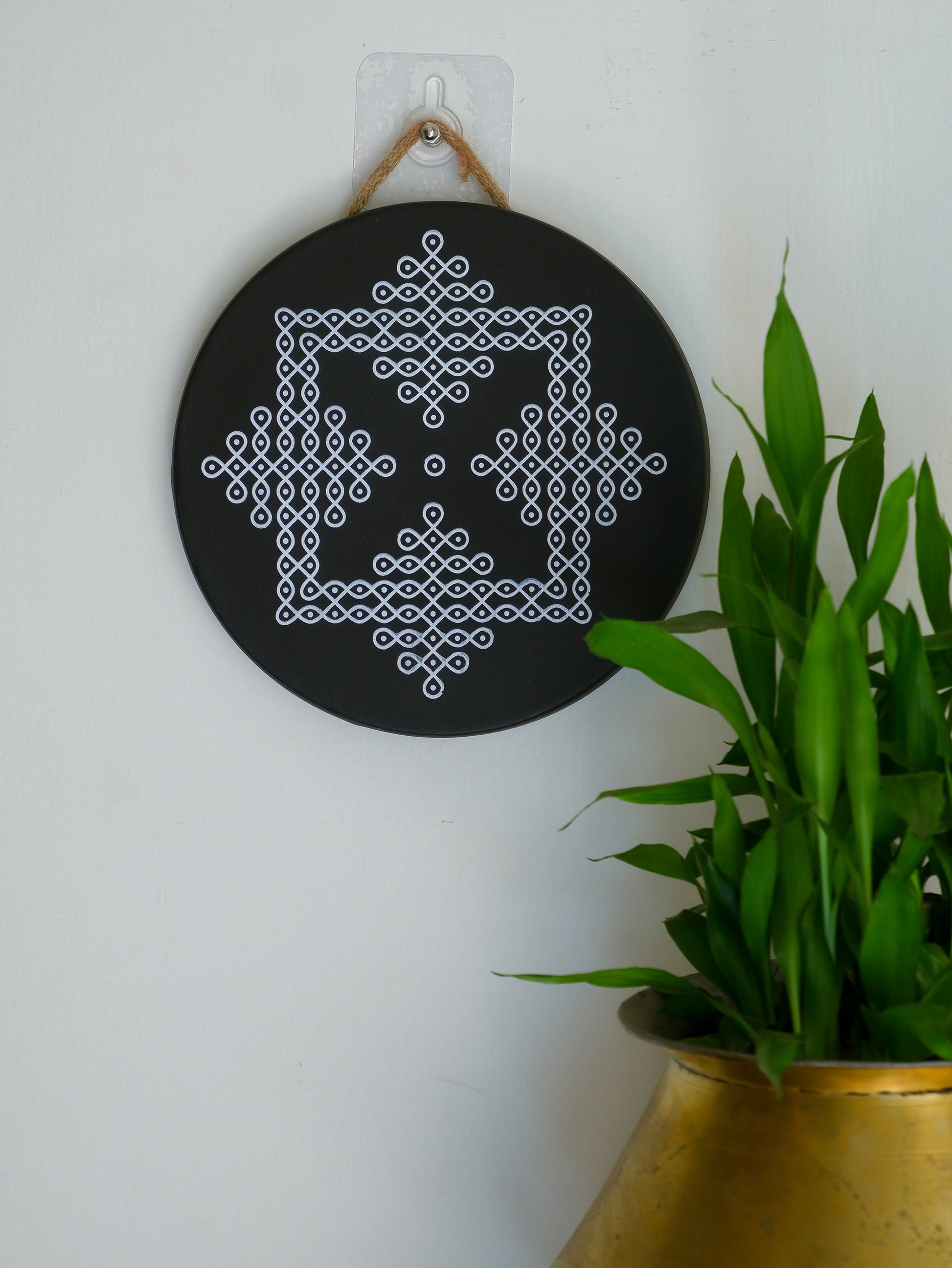 wall hanging image of 8 inch  black Traditional South Indian Sikku Kolam Terracotta Wall Plates for Indian Homes