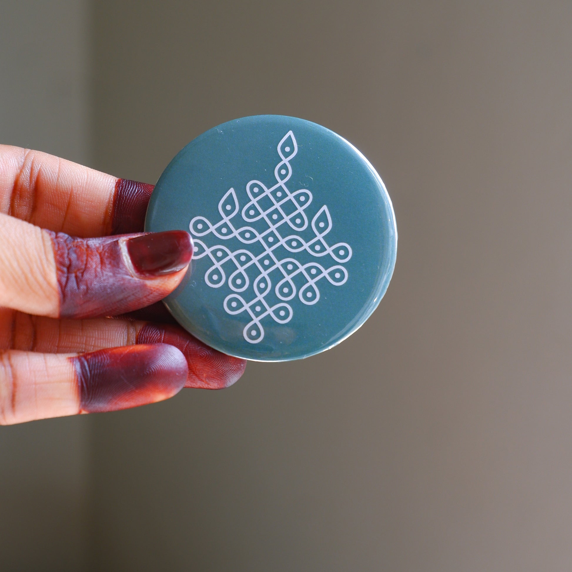 Blue Sikku Kolam Fridge Magnet inspired by traditional Kolam art