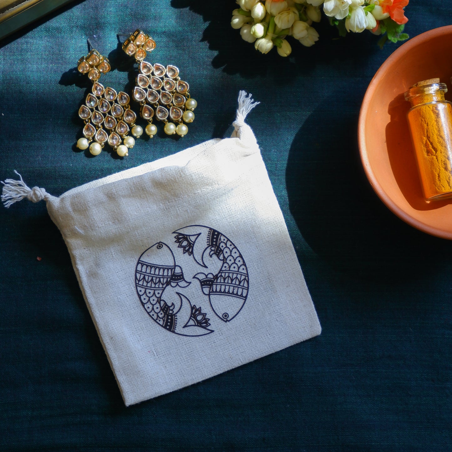 Drawstring Madhubani cotton pouch for wedding gifting