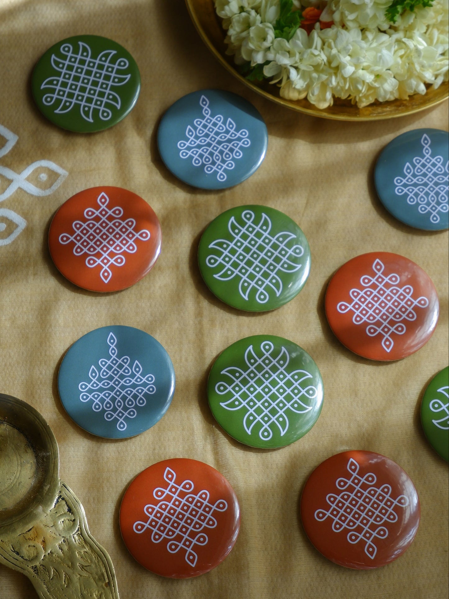 Vibrant round magnets featuring traditional Kolam art  adds a cultural touch to your kitchen or workspace