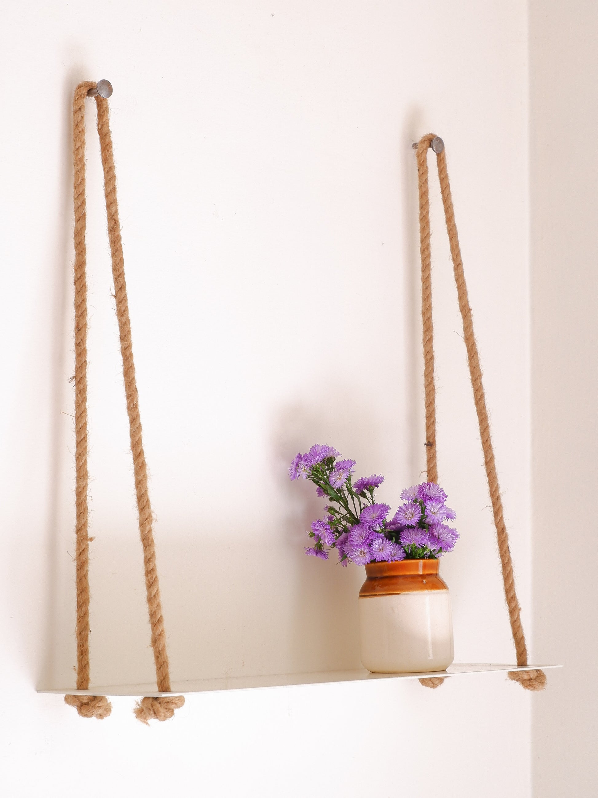Shop white Hanging Metal Shelf to display plants. Delivered all India